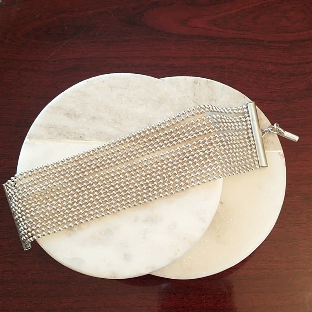 Silver multi strand bracelet.